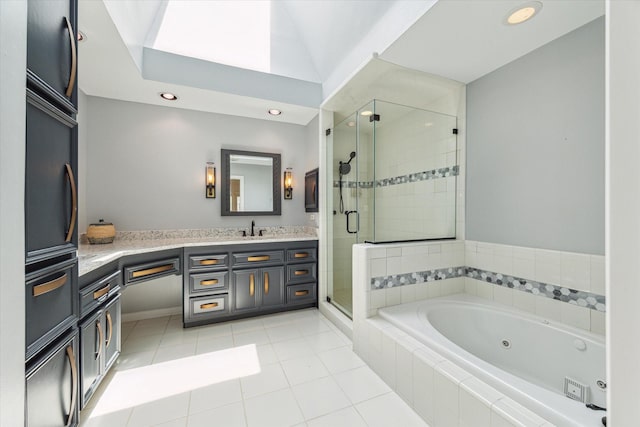 2007 Indiana St, Houston, TX 77019 - full bathroom with a shower stall, a jetted tub, vanity, recessed lighting, and tile patterned floors