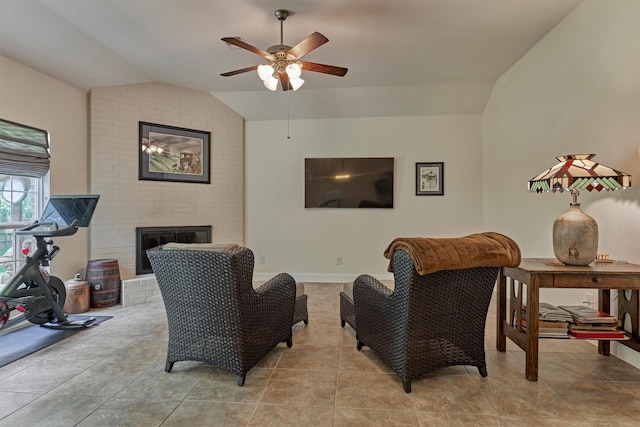10910 Maddys Ct, Montgomery, TX 77316 - living area featuring vaulted ceiling, a ceiling fan, and a brick fireplace