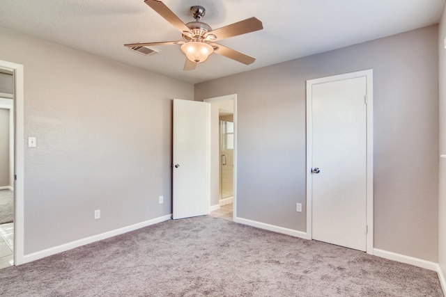 304 Lisa Ct, Friendswood, TX 77546 - unfurnished bedroom with carpet flooring, baseboards, and ceiling fan