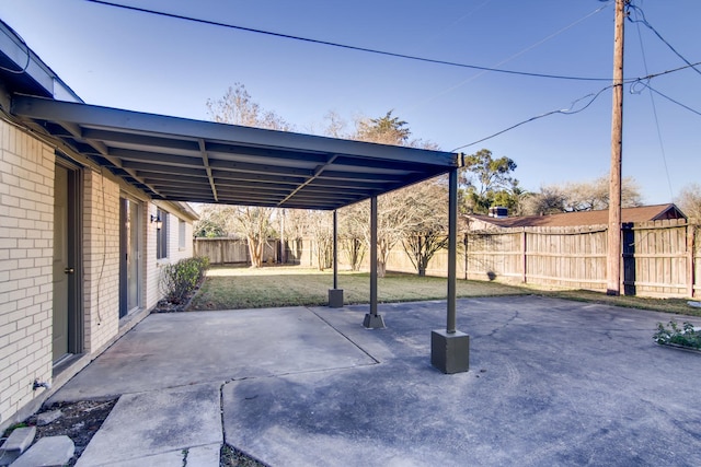 304 Lisa Ct, Friendswood, TX 77546 - fenced backyard with a patio
