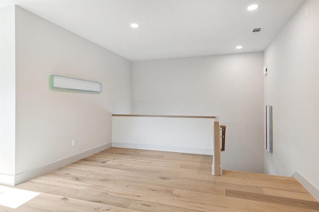 2129 Quenby St, Houston, TX 77005 - unfurnished room with recessed lighting, wood finished floors, and baseboards