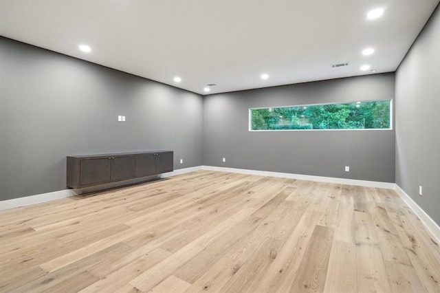 2129 Quenby St, Houston, TX 77005 - spare room featuring light wood finished floors, recessed lighting, and baseboards