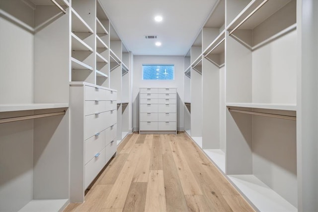 2129 Quenby St, Houston, TX 77005 - walk in closet featuring light wood-type flooring