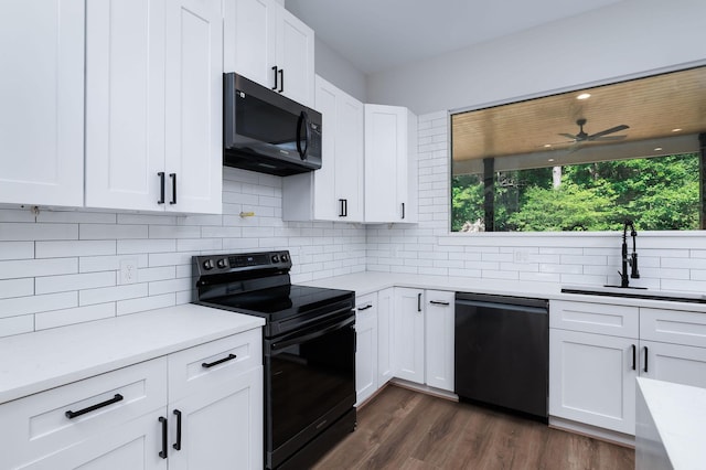 354 Peach Point Ln, Trinity, TX 75862 - kitchen featuring electric range, dishwashing machine, a sink, and healthy amount of natural light