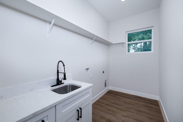 354 Peach Point Ln, Trinity, TX 75862 - laundry room featuring cabinet space, washer hookup, baseboards, dark wood-type flooring, and electric dryer hookup