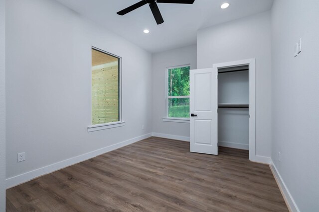 354 Peach Point Ln, Trinity, TX 75862 - unfurnished bedroom featuring dark wood-type flooring, recessed lighting, baseboards, and ceiling fan