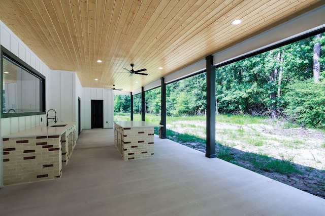 354 Peach Point Ln, Trinity, TX 75862 - view of patio featuring a sink and ceiling fan