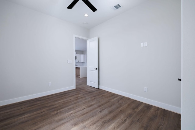 354 Peach Point Ln, Trinity, TX 75862 - empty room with a ceiling fan, dark wood finished floors, baseboards, and recessed lighting