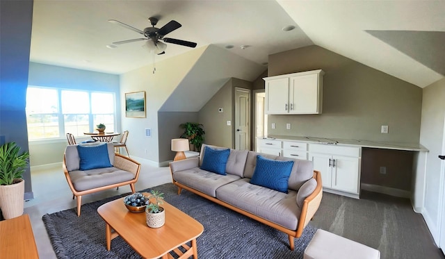 1306 Hidden Oaks Dr, Tomball, TX 77375 - living room featuring a ceiling fan, lofted ceiling, and baseboards