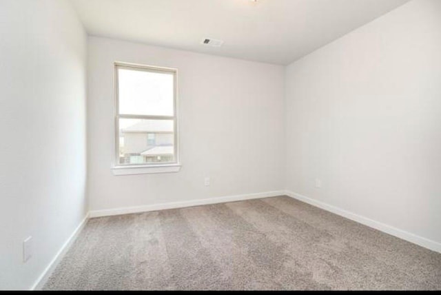 2726 Little Caney Way, Conroe, TX 77301 - empty room featuring carpet floors and baseboards