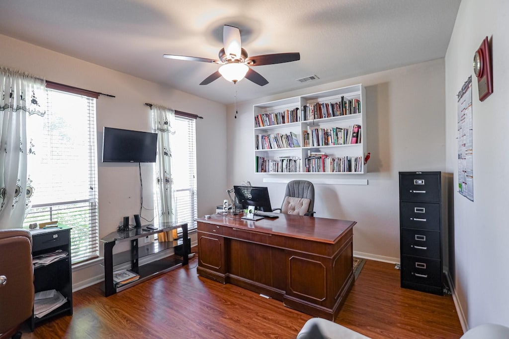3202 Dogwood Knoll Trl, Rosenberg, TX 77471 - office space with a ceiling fan, healthy amount of natural light, dark wood finished floors, and baseboards