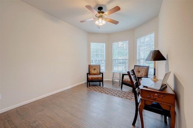 20810 Mansfield Bay Ln, Richmond, TX 77407 - home office with a ceiling fan, wood finished floors, and baseboards