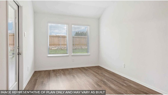 24711 Sage Mdws, Magnolia, TX 77355 - unfurnished room featuring wood finished floors and baseboards