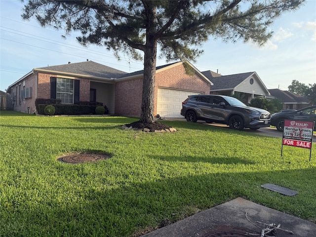 19307 Desert Moon Dr, Cypress, TX 77433 - view of front facade featuring brick siding, a garage, and a front lawn