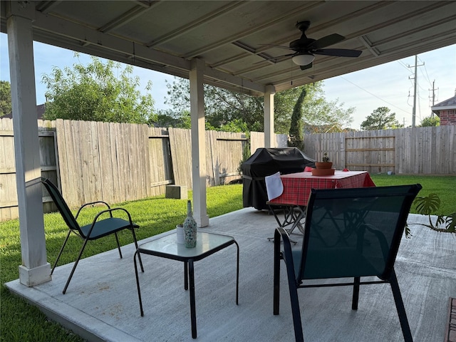 19307 Desert Moon Dr, Cypress, TX 77433 - view of patio with a ceiling fan, outdoor dining area, and grilling area