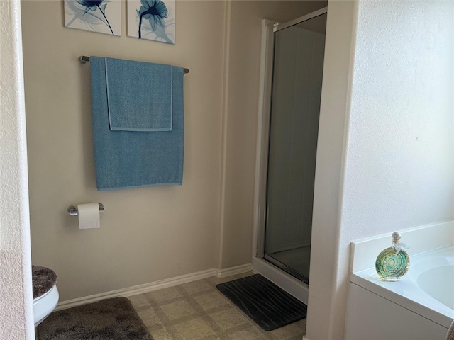 19307 Desert Moon Dr, Cypress, TX 77433 - full bathroom featuring a stall shower, toilet, a garden tub, and tile patterned floors