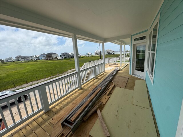 806 93rd St, Galveston, TX 77554 - porch featuring a residential view and a yard
