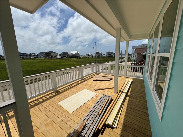 806 93rd St, Galveston, TX 77554 - wooden deck featuring a residential view and a yard
