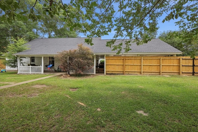 504 County Road 763 N, Buna, TX 77612 - rear view of property featuring a shingled roof