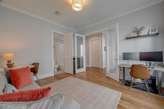 5213 Feagan St Unit H, Houston, TX 77007 - office featuring french doors, ornamental molding, wood finished floors, and baseboards
