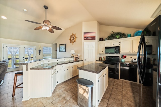 3190 Fm-2031, Matagorda, TX 77414 - kitchen featuring black appliances, a peninsula, lofted ceiling, ceiling fan, and tile countertops