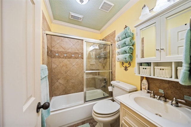 3190 Fm-2031, Matagorda, TX 77414 - full bathroom featuring toilet, shower / bath combination with glass door, vanity, ornamental molding, and a textured ceiling