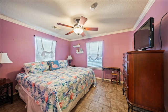 3190 Fm-2031, Matagorda, TX 77414 - bedroom with ornamental molding, baseboards, ceiling fan, and a textured ceiling