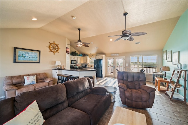 3190 Fm-2031, Matagorda, TX 77414 - tiled living area with lofted ceiling, a ceiling fan, french doors, and recessed lighting