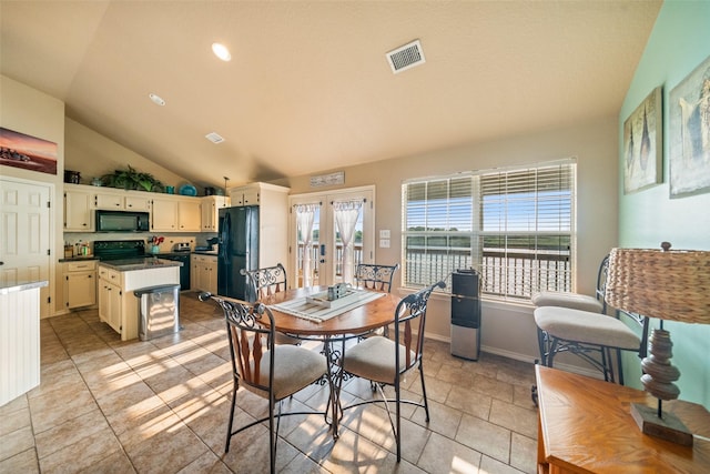 3190 Fm-2031, Matagorda, TX 77414 - dining area featuring french doors and vaulted ceiling