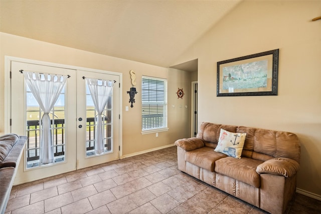 3190 Fm-2031, Matagorda, TX 77414 - living area featuring lofted ceiling, french doors, and baseboards