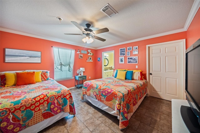 3190 Fm-2031, Matagorda, TX 77414 - bedroom featuring crown molding, a ceiling fan, a textured ceiling, ensuite bath, and stone finish floors