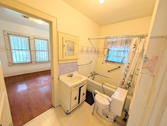 622 Gazin St, Houston, TX 77020 - full bathroom with toilet, shower / bathtub combination with curtain, tile patterned floors, and vanity