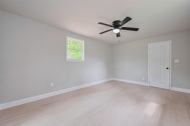 131 Holiday Blvd, Coldspring, TX 77331 - spare room with light wood-style flooring, baseboards, and a ceiling fan