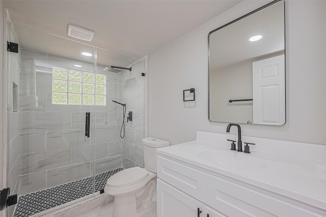131 Holiday Blvd, Coldspring, TX 77331 - full bath with toilet, a shower stall, vanity, and recessed lighting