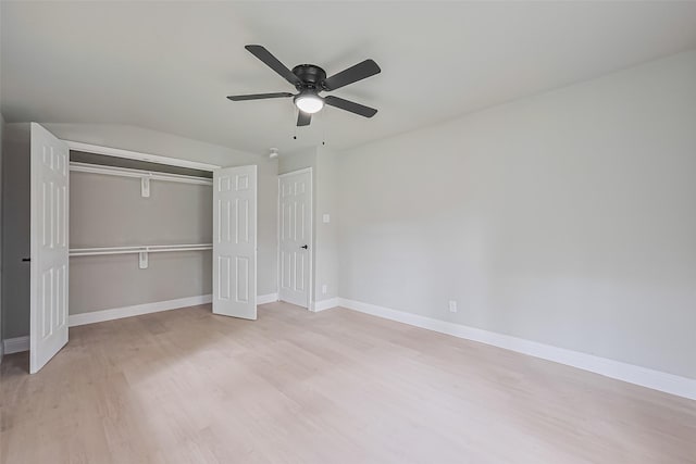 131 Holiday Blvd, Coldspring, TX 77331 - unfurnished bedroom with light wood-style floors, a closet, baseboards, and ceiling fan