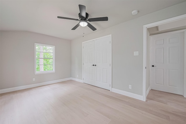 131 Holiday Blvd, Coldspring, TX 77331 - unfurnished bedroom featuring light wood-style flooring, baseboards, a closet, and ceiling fan