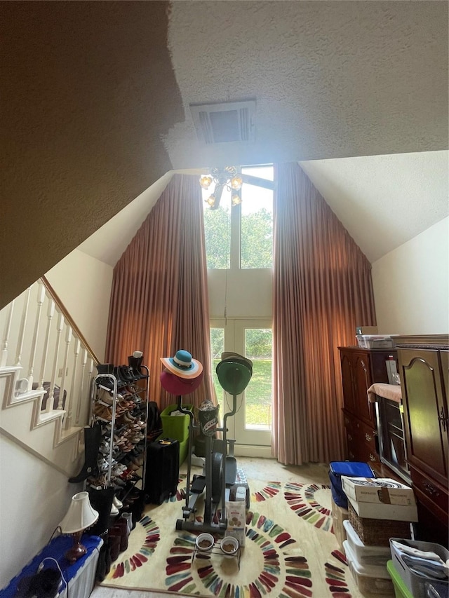 17518 Jackson Pnes, Houston, TX 77090 - bonus room with high vaulted ceiling, a textured ceiling, stairway, and carpet flooring