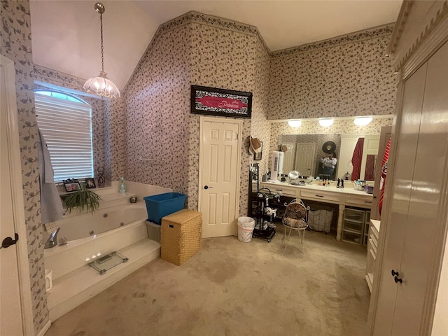 17518 Jackson Pnes, Houston, TX 77090 - bathroom with wallpapered walls, lofted ceiling, a tub with jets, and vanity
