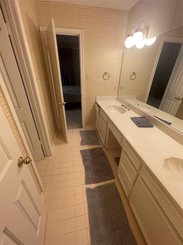 17518 Jackson Pnes, Houston, TX 77090 - ensuite bathroom with tile patterned floors and double vanity