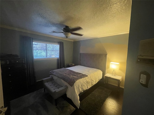 17518 Jackson Pnes, Houston, TX 77090 - bedroom featuring a textured ceiling, crown molding, a ceiling fan, wood finished floors, and baseboards
