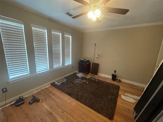 17518 Jackson Pnes, Houston, TX 77090 - workout area with hardwood / wood-style flooring, ceiling fan, ornamental molding, and baseboards