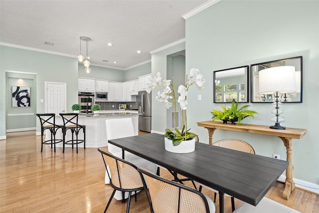 1107 Walden Hill Ct, Houston, TX 77077 - dining room with crown molding, baseboards, light wood finished floors, and recessed lighting