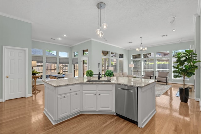 1107 Walden Hill Ct, Houston, TX 77077 - kitchen featuring a sink, dishwasher, ornamental molding, open floor plan, and hanging light fixtures