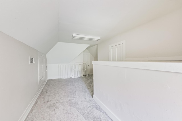 612 S Day St, Brenham, TX 77833 - additional living space with light colored carpet, lofted ceiling, and baseboards