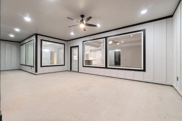 28200 E Stallion Ln, Waller, TX 77484 - empty room with a decorative wall, ornamental molding, a ceiling fan, and recessed lighting