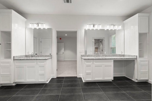 28200 E Stallion Ln, Waller, TX 77484 - full bathroom with tile patterned floors, two vanities, and a shower