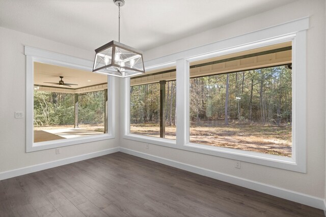 28200 E Stallion Ln, Waller, TX 77484 - unfurnished dining area with plenty of natural light, baseboards, and a chandelier
