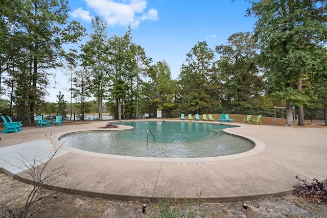 28200 E Stallion Ln, Waller, TX 77484 - community pool featuring a patio