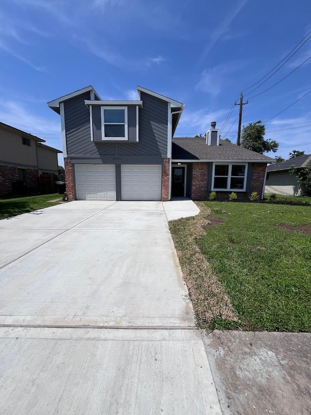 8330 Blue Quail Dr, Houston, TX 77489 - view of front of house featuring a garage, driveway, brick siding, a front yard, and a chimney