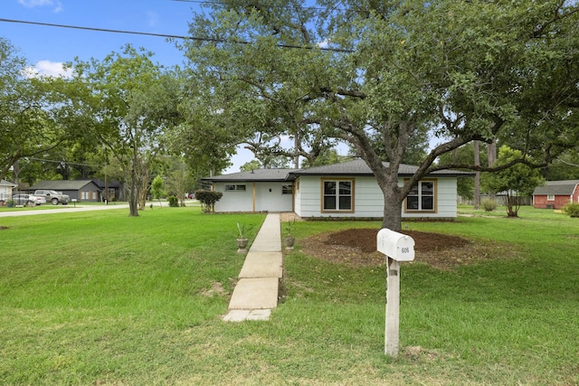 606 Clayton St, Tomball, TX 77375 - view of front of home with a front lawn